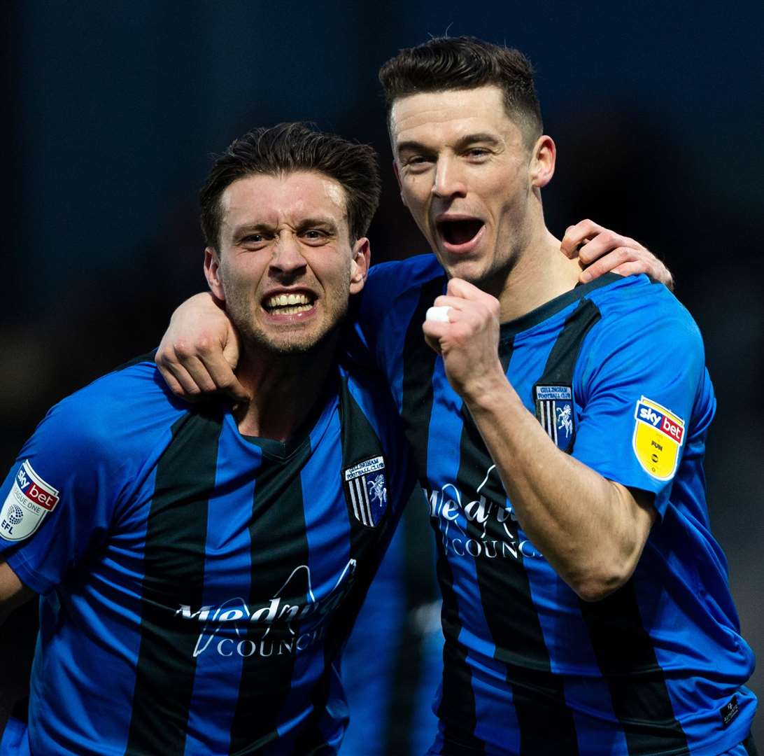 Callum Reilly celebrates scoring from the spot against Burton Albion with Luke O'Neill Picture: Ady Kerry