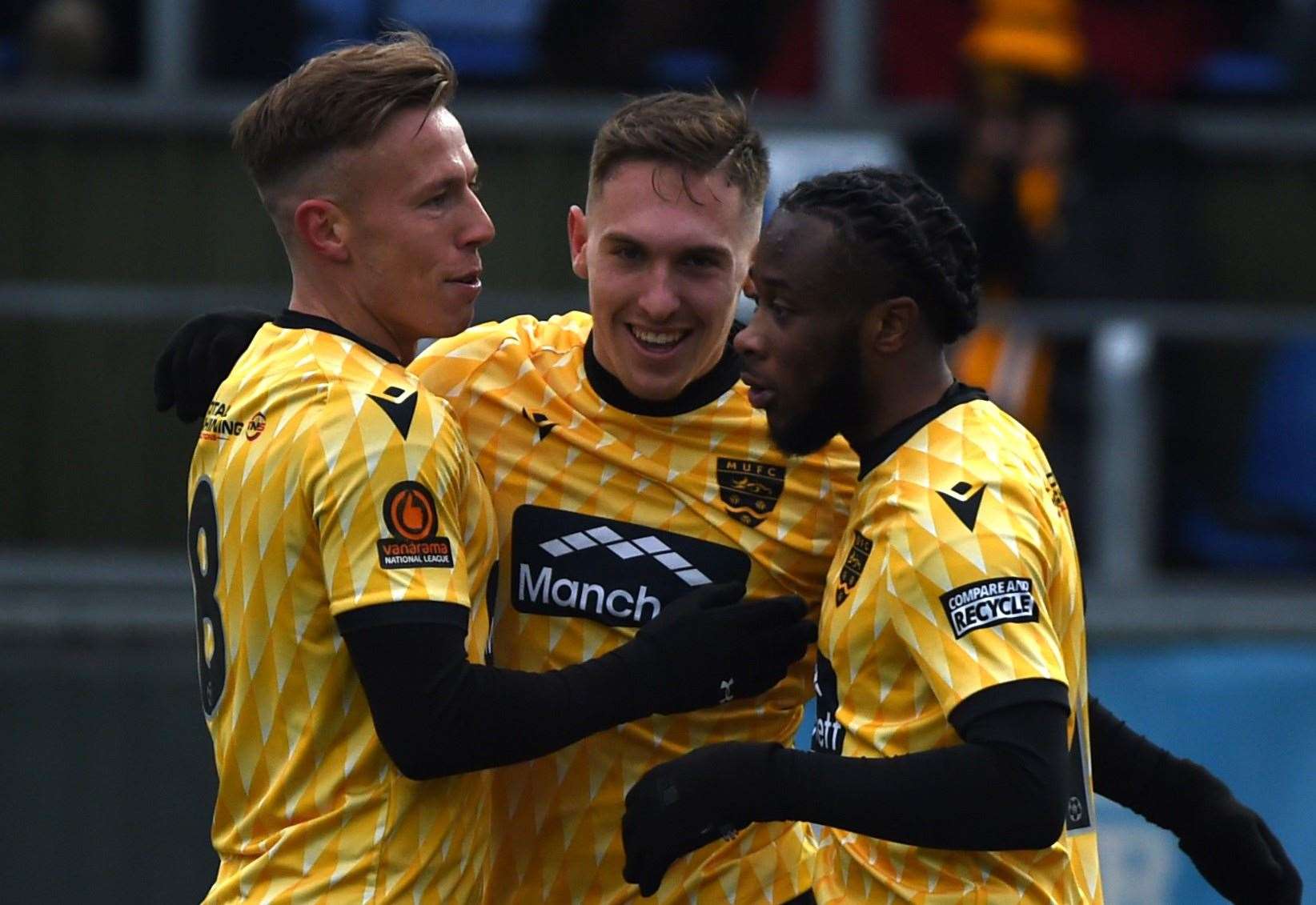 Matt Rush, centre, celebrates his goal at Havant with Sam Corne and Jephte Tanga. Picture: Steve Terrell