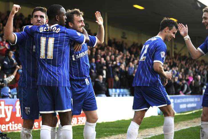 Charlie Lee celebrates his match-winning goal with team-mates Picture: Barry Goodwin