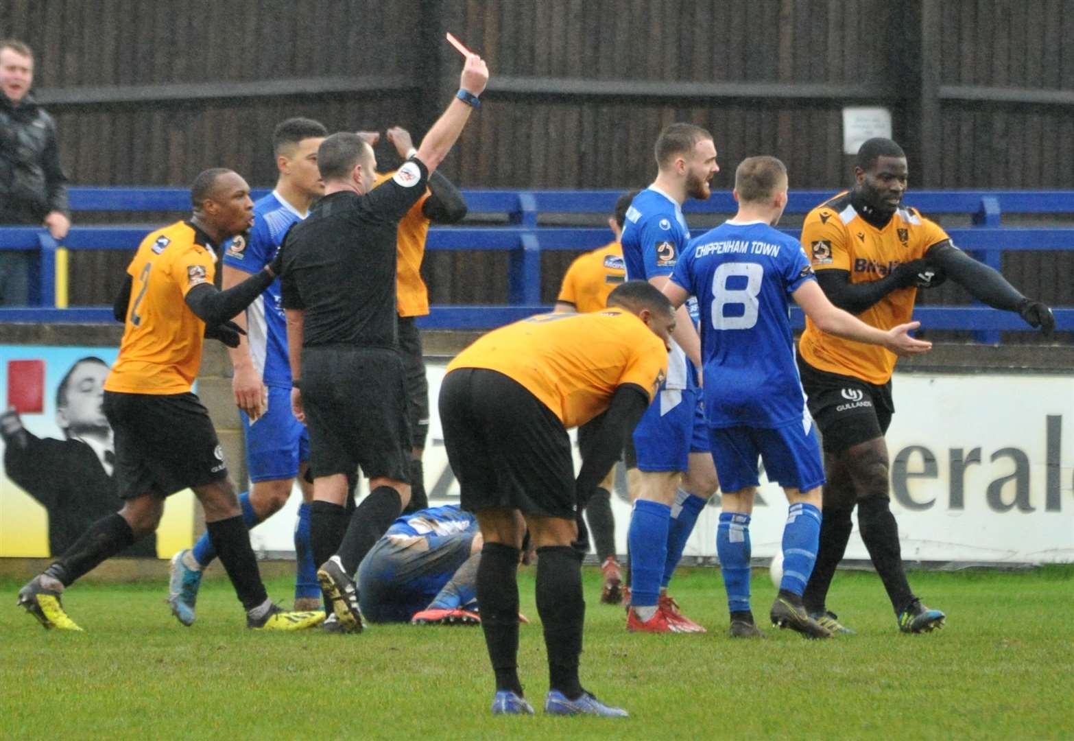 Maidstone skipper George Elokobi is sent off at Chippenham Picture: Steve Terrell