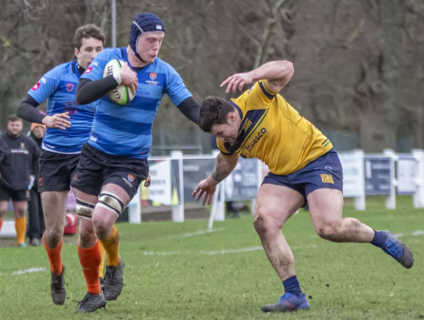 Jesse de Vries of Canterbury (blue) takes on Henley. Picture: Phillipa Hilton