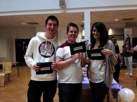 George Yardley, Sam Humphries and Nicole Moor from Holmesdale School celebrate their A level results.