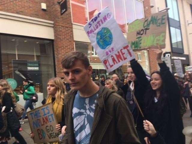 Strikers marching through Canterbury city centre