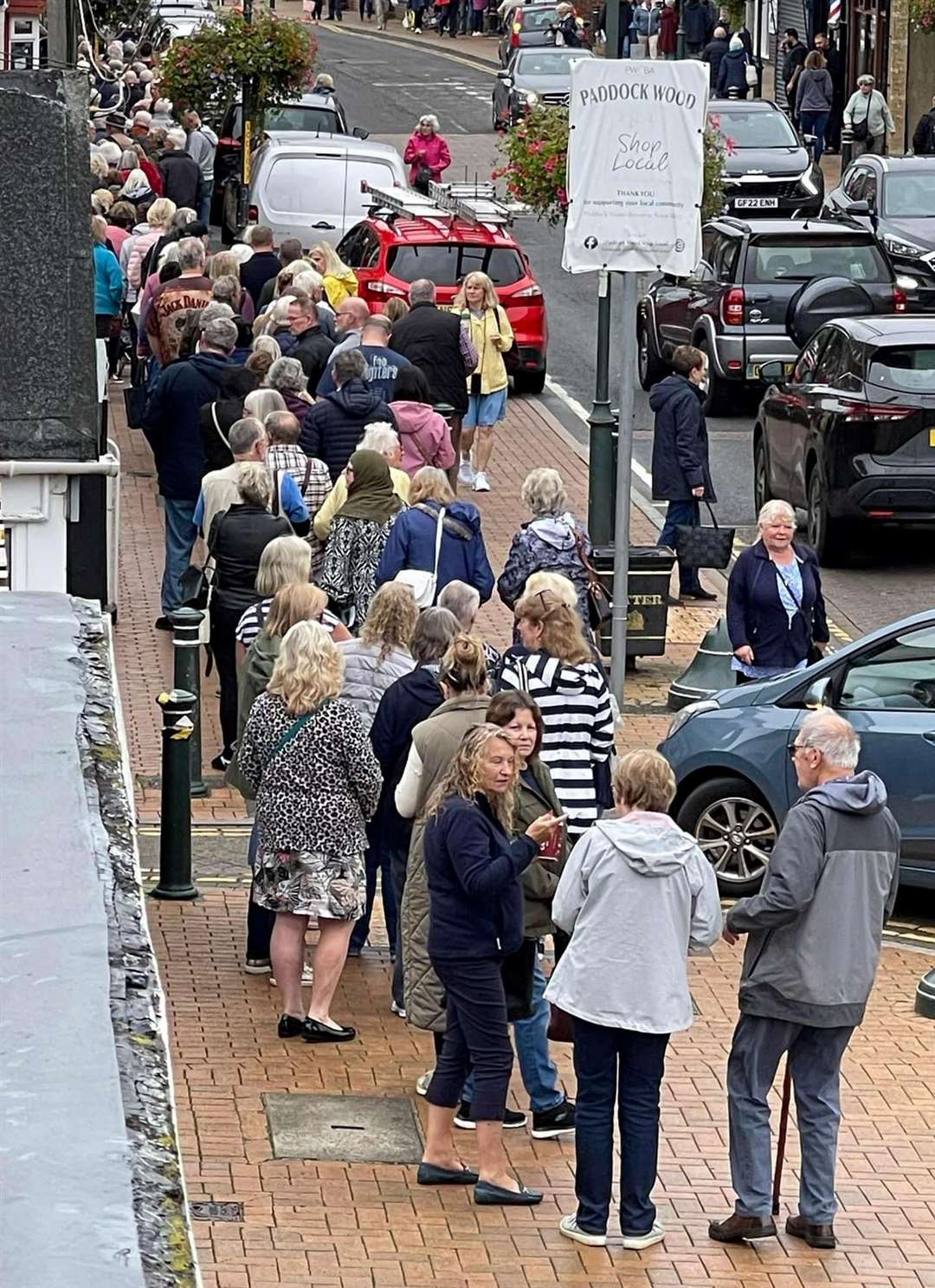 The queue in Paddock Wood High Street this morning for a sale preview at Barsleys. Picture: Clare Patridge