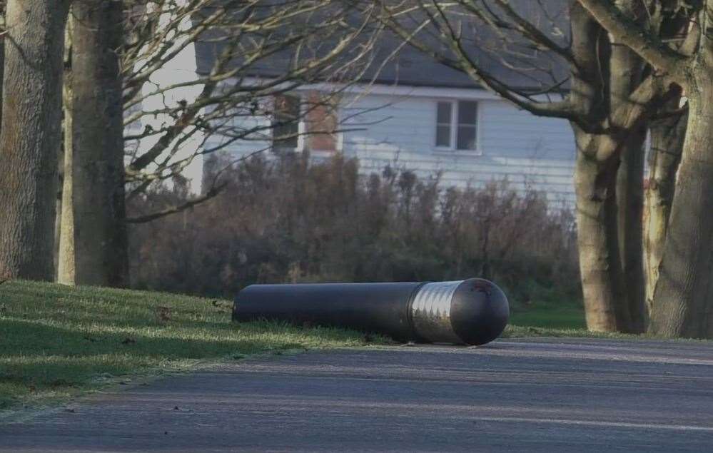 A number of broken bollards litter the estate