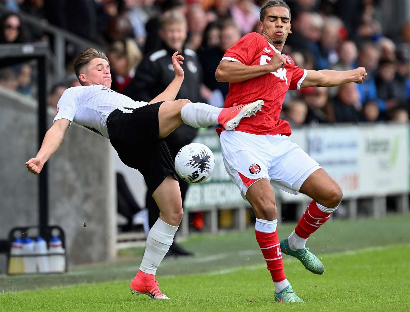 Jayden Boulton is forced on the stretch by Charlton’s Tennai Watson during Saturday’s friendly. Picture: Keith Gillard