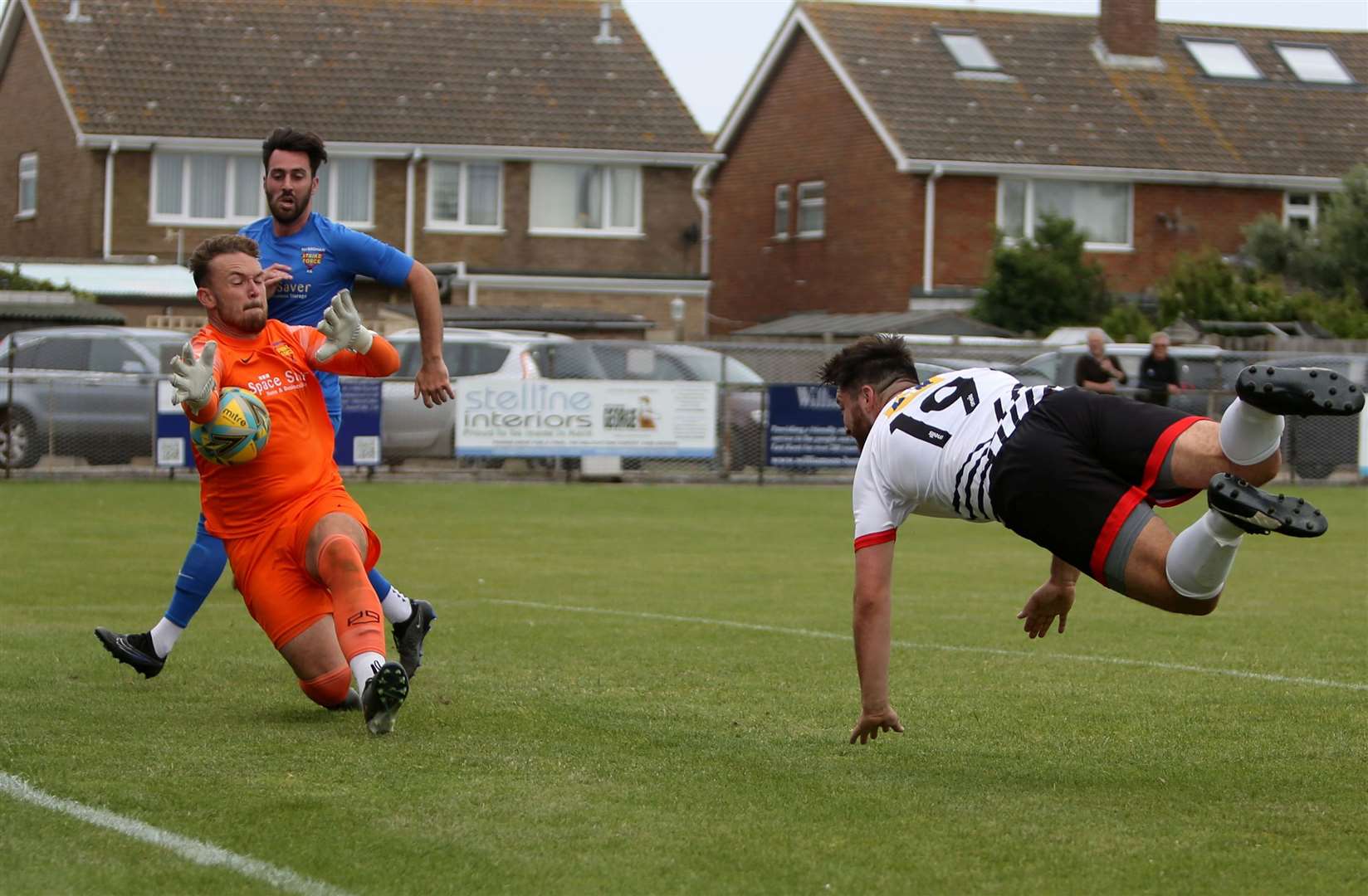 Away goalkeeper Harry Earls denies Deal striker Connor Coyne. Picture: Paul Willmott