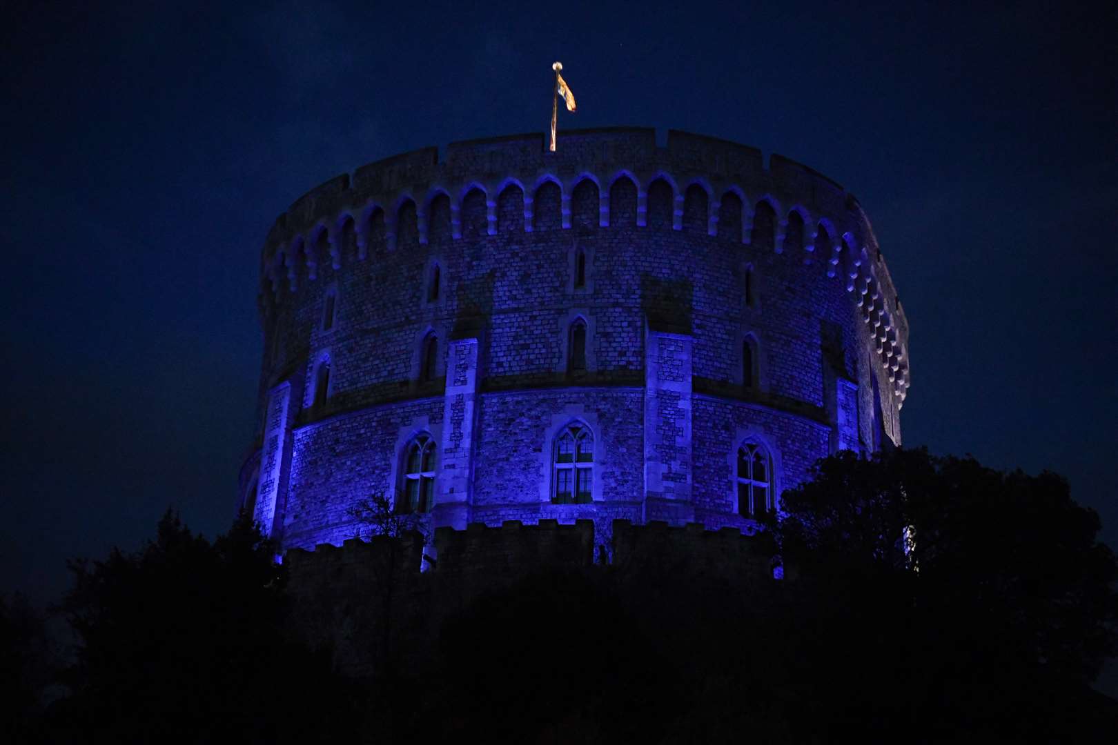 Windsor Castle is turned blue to salute local heroes during Thursday’s nationwide Clap for Carers NHS initiative to applaud NHS workers fighting the coronavirus pandemic when landmarks across the UK will be lit blue.