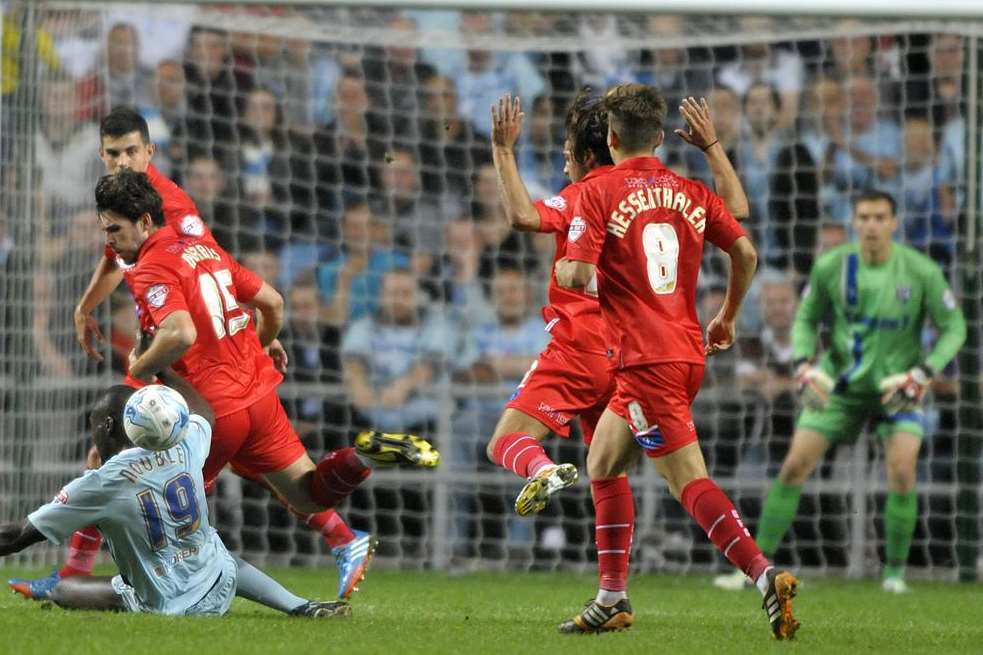 Former Gills loanee Frank Nouble takes a tumble but scored the only goal as Coventry edged Friday's clash at the Ricoh Arena Picture: Barry Goodwin