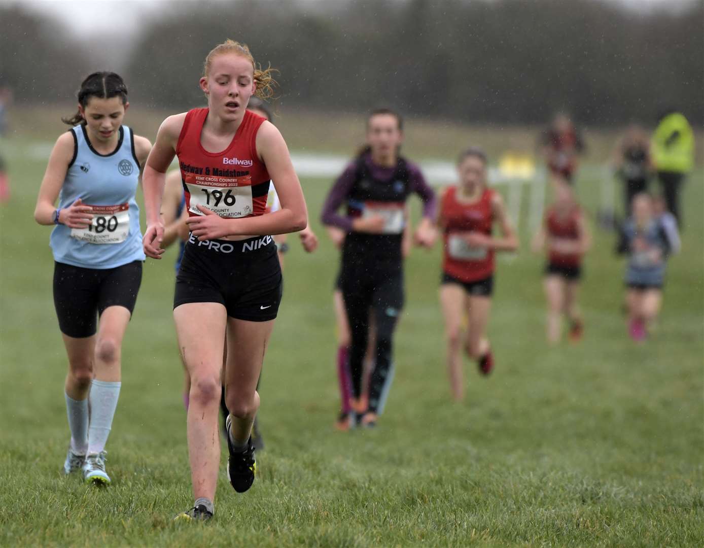 Medway and Maidstone's Millie Dack tries to keep those behind her at bay in the under-15 girls' race. Picture: Barry Goodwin (54151819)