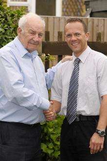 Alf Stupple shakes the hand of Daren Tidbury who helped perform CPR on his wife Agnes after she collapsed in the street