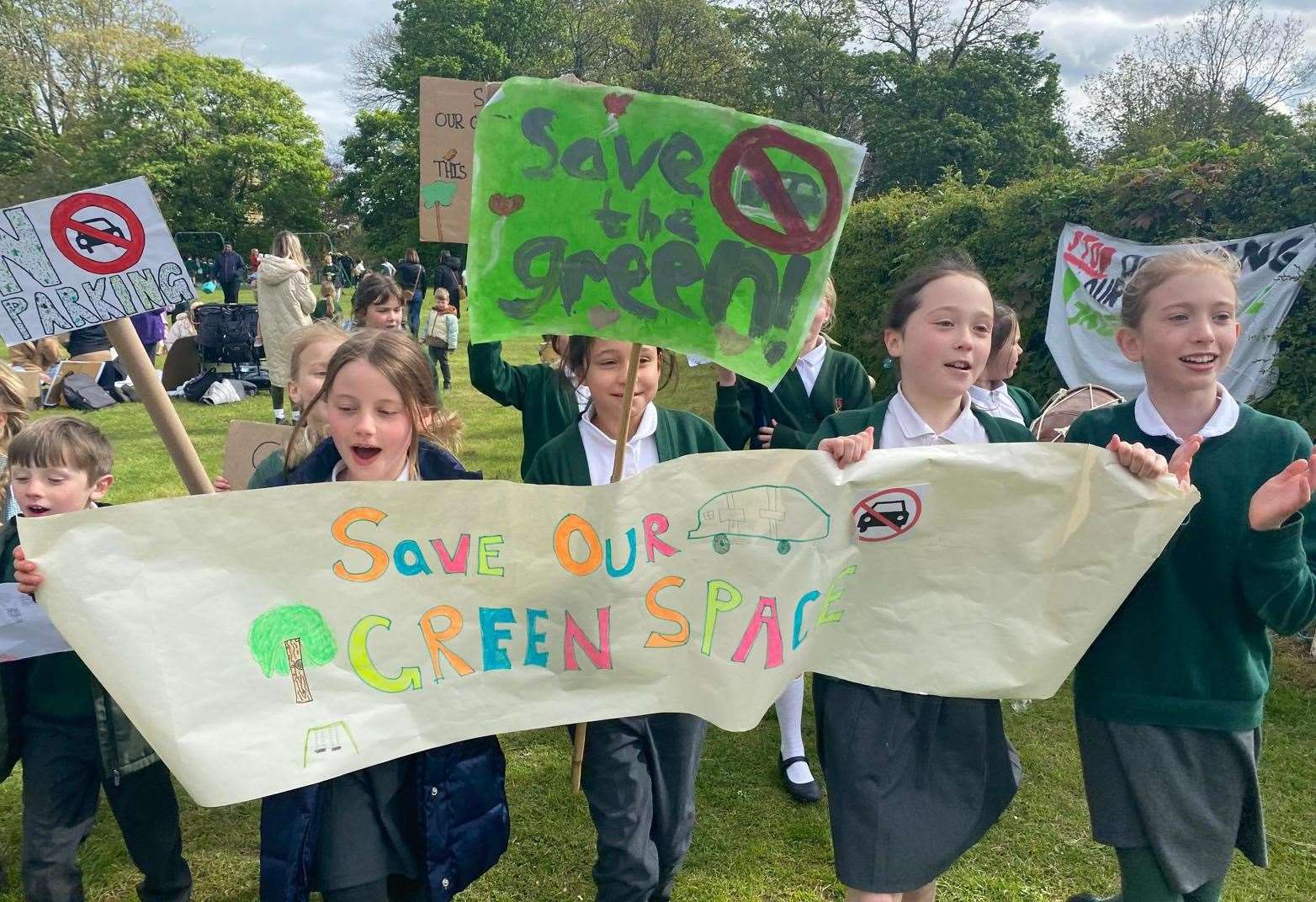 The children of Slade Primary School make their views on the proposed extension of Castle Fields car park known