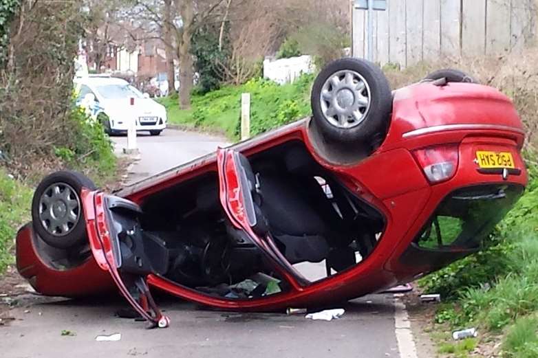 Police were called out to an overturned car in Landseer Avenue, Gravesend. Picture: Roger Kasper