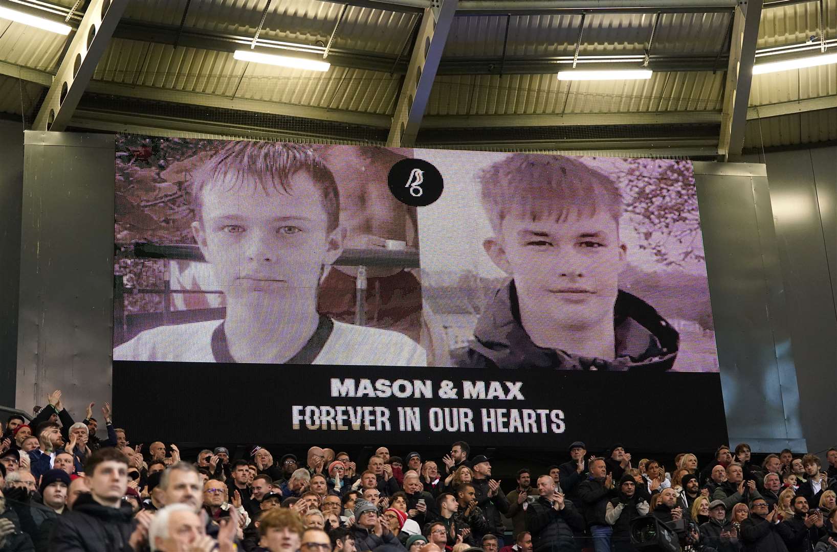 A tribute to Mason Rist and Max Dixon on the big screen at Ashton Gate during Bristol City’s Sky Bet Championship match against Leeds United in February (Bradley Collyer/PA)