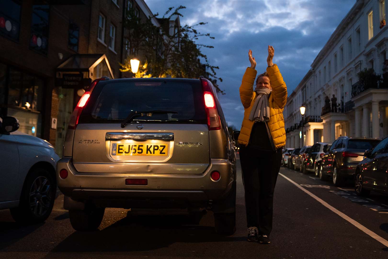 Members of the public clap outside the Chelsea and Westminster Hospital (Aaron Chown/PA)