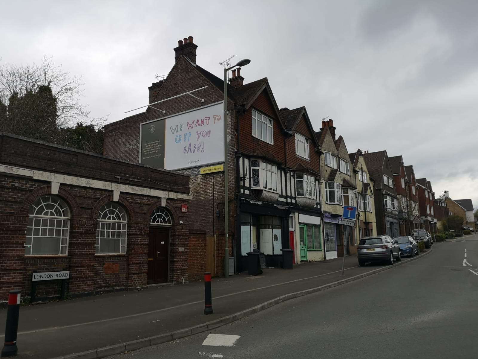 The billboard stands at a roundabout in Hindhead (Huntington and Langham Estate/PA)