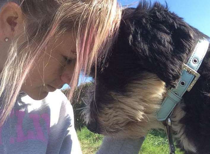 Kymm White with one of the dogs at the South East Dog Rescue Centre