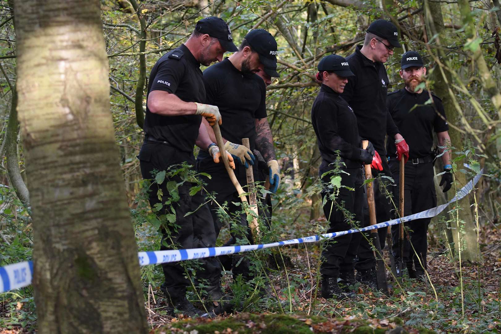 Police scour the countryside in Hartley. Picture: Steve Finn