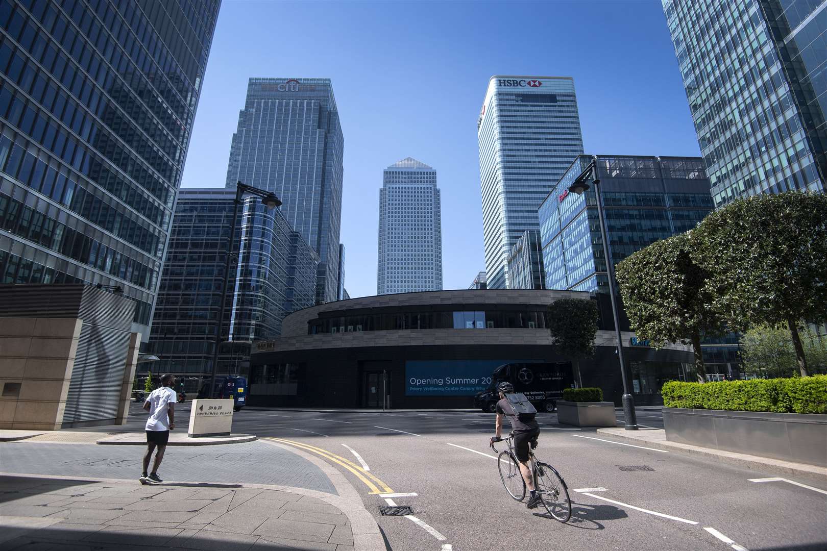 A nearly deserted street at lunchtime in Canary Wharf (Victoria Jones/PA)