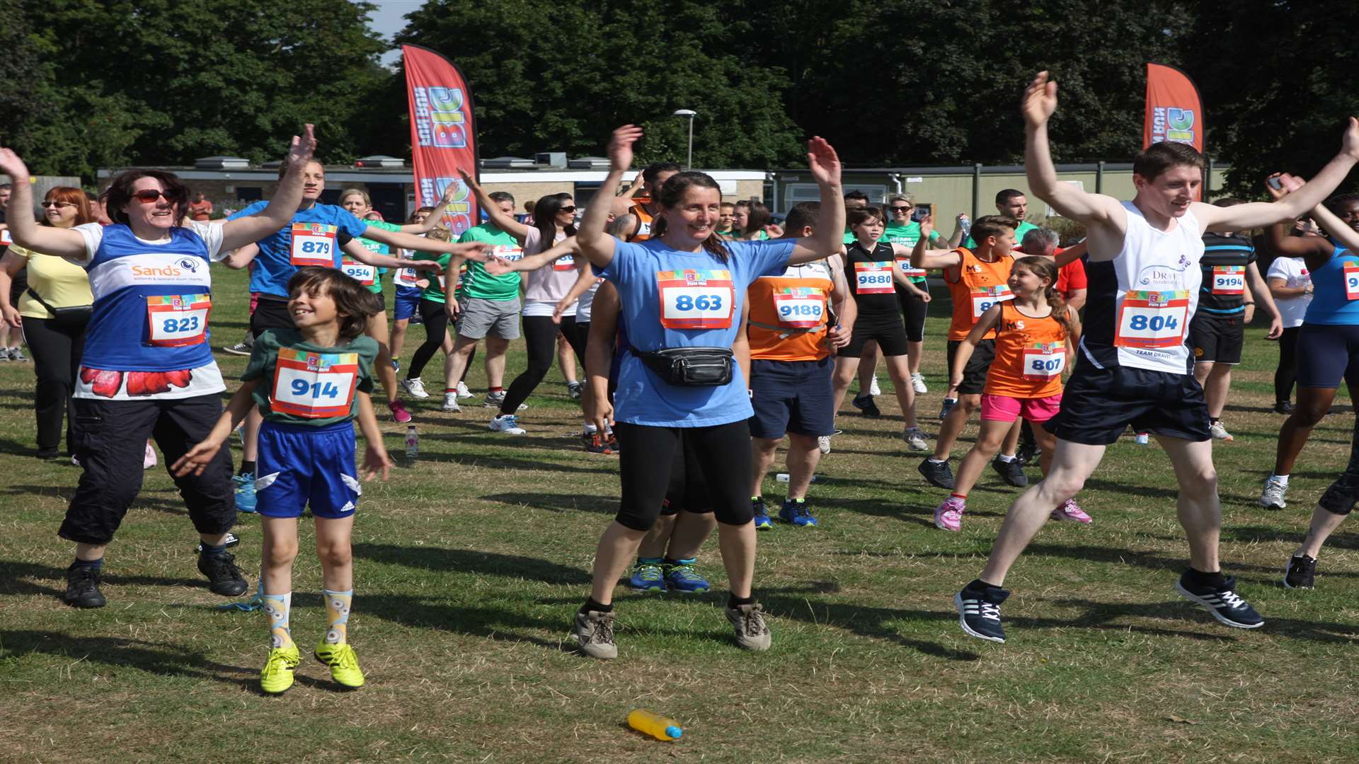 Runners warm up at the Big Fun 5k Run