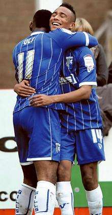 Dennis Oli and Jordan Obita celebrate the second Gillingham goal