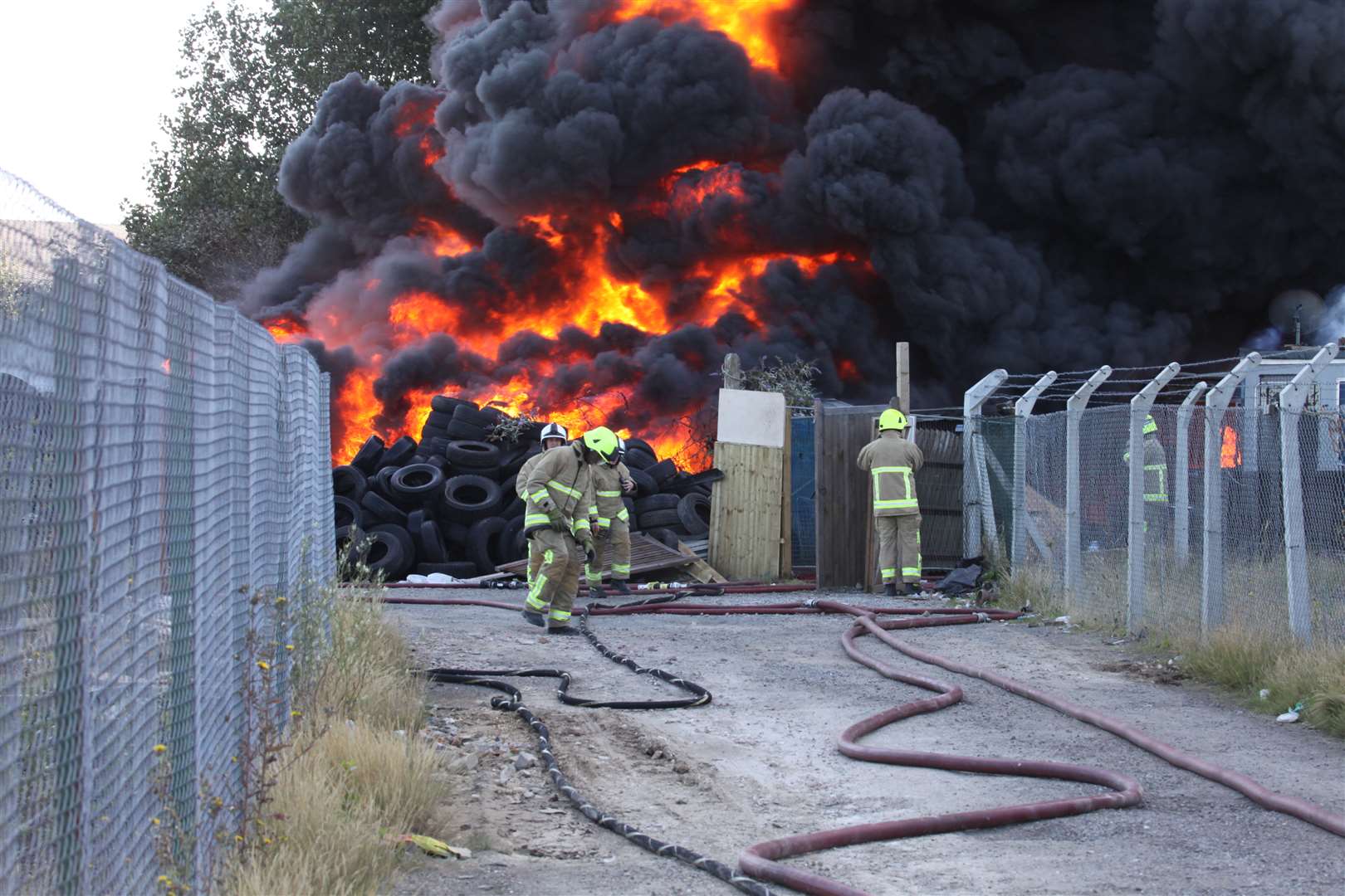 Firefighters tackling large tyre fire in Gravesend. Picture: Phil Tobin