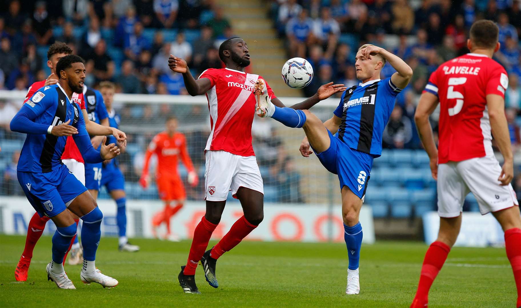 Gillingham midfielder Kyle Dempsey in the thick of the action. Picture: Andy Jones (50452122)