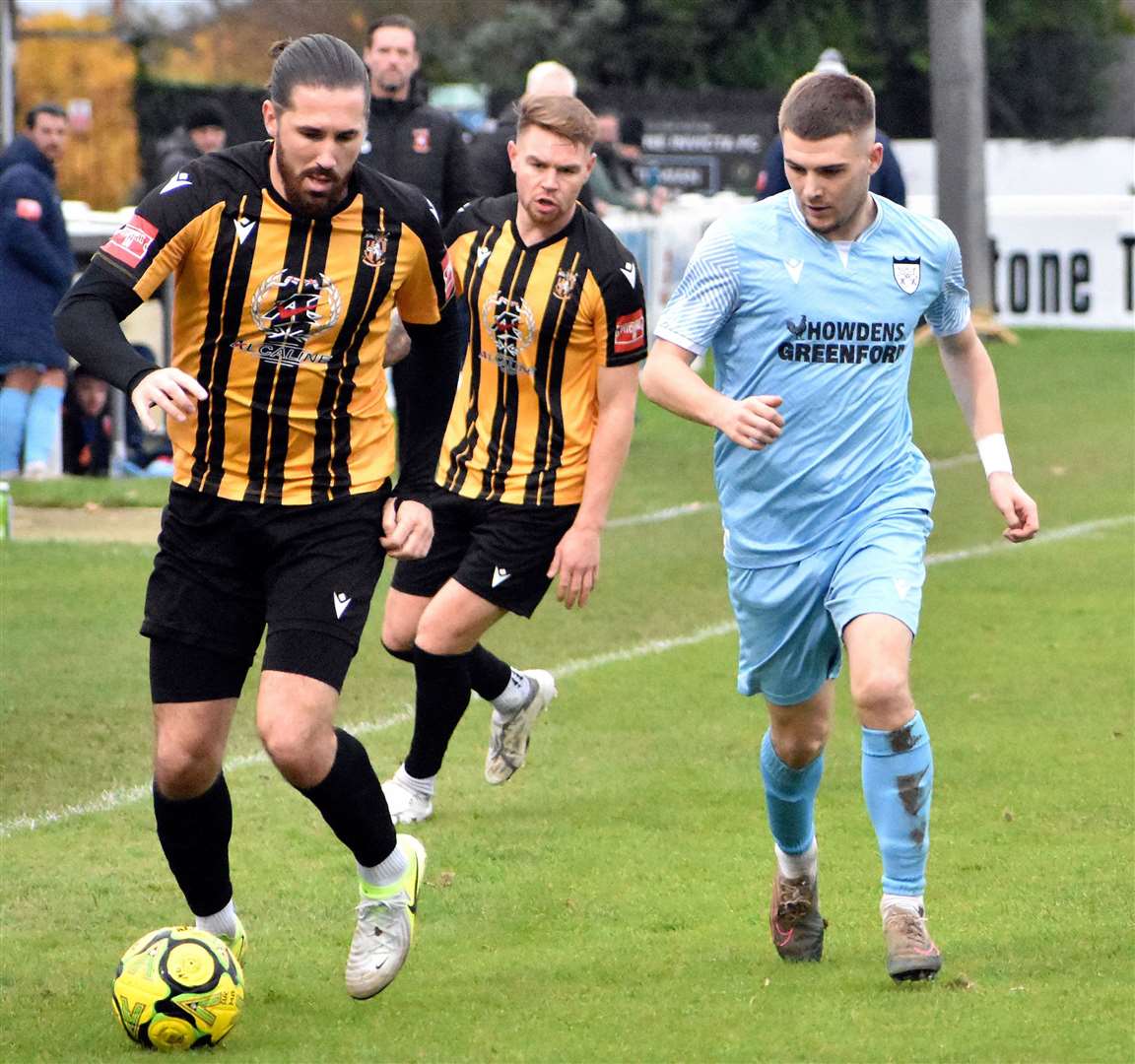 Forward Tom Derry in possession during Folkestone’s 2-0 FA Trophy home defeat to Hanwell Town on Saturday. Picture: Randolph File