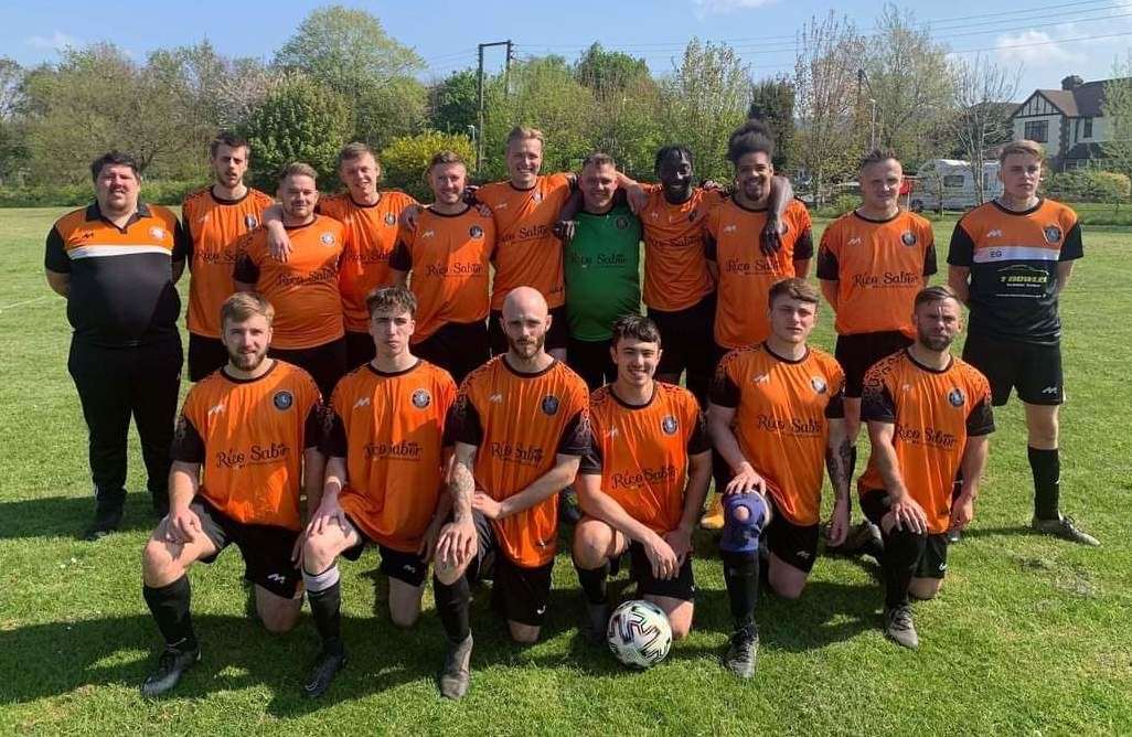 Kevin (in green) and his football team, the White Horse Jaguars. Picture: Kevin Clark