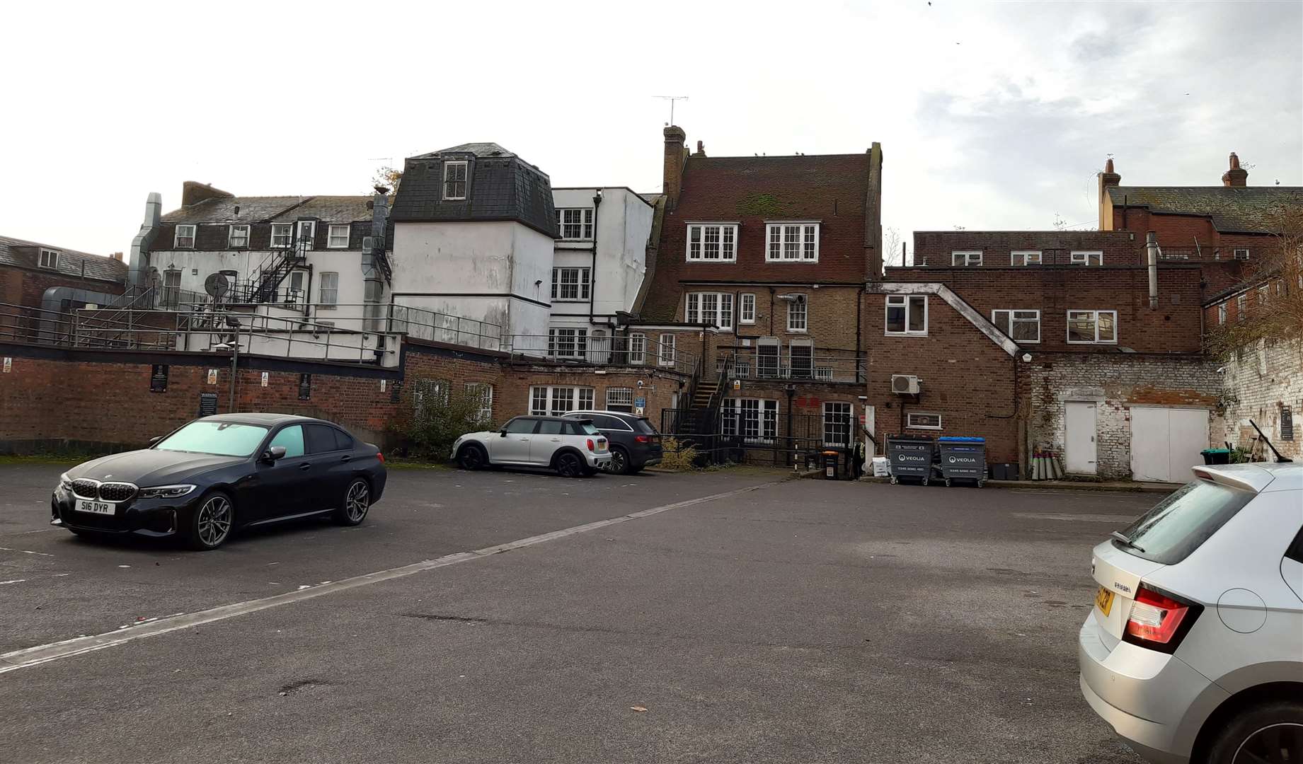 The car park backing onto bus stops where a woman was raped