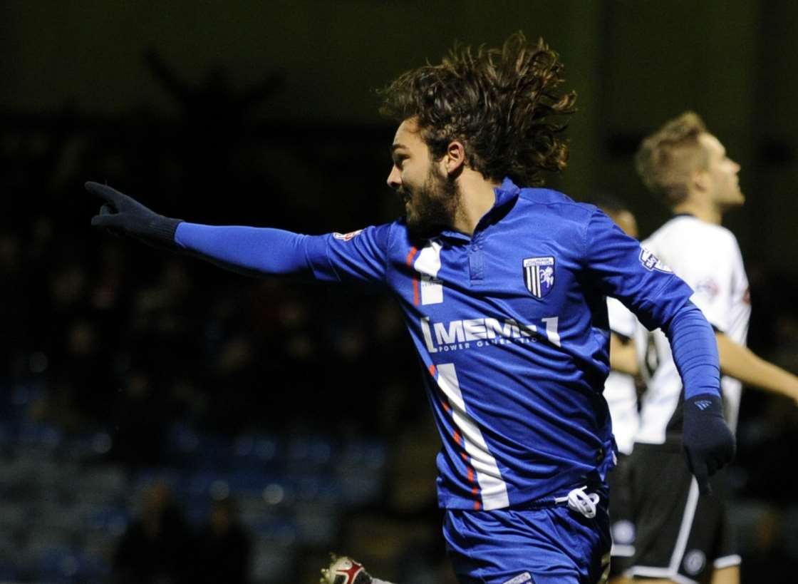 Bradley Dack celebrates scoring Gills' opener against Rochdale Picture: Barry Goodwin