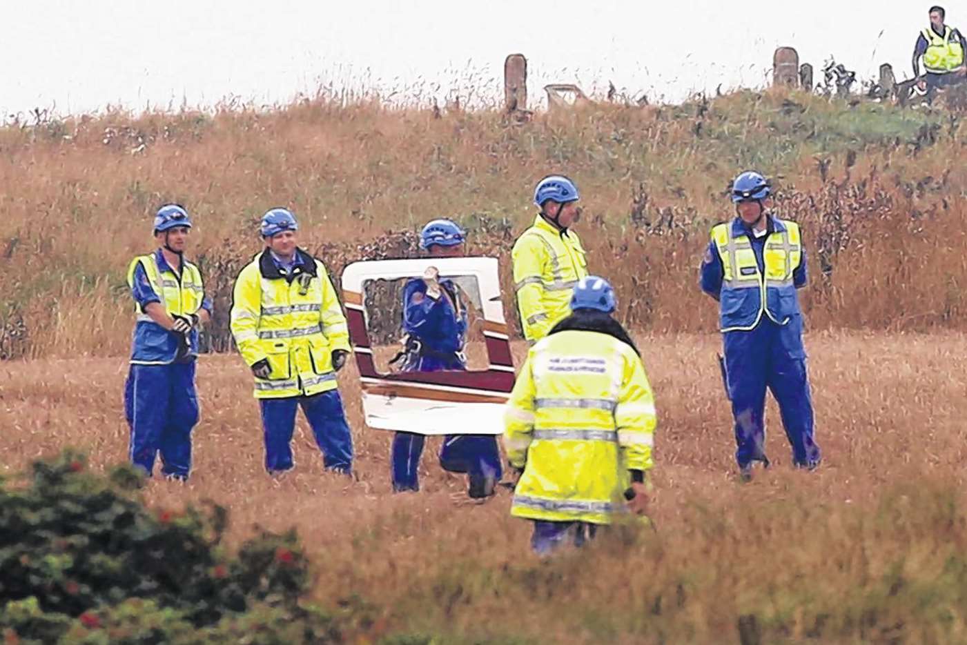 Parts of the helicopter's wreckage are salvaged. Picture Ross Parry/SWNS Group