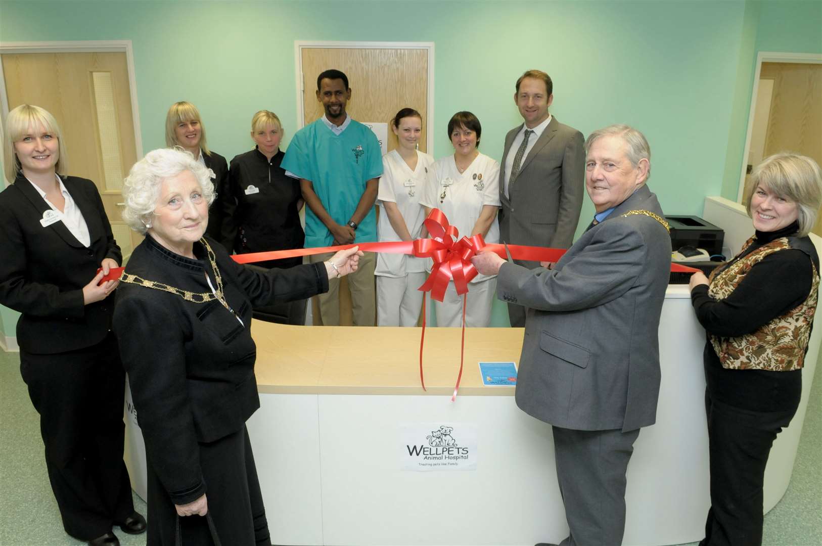 Cutting the opening ribbon of the new branch of Wellpets Animal Hospital in Sittingbourne. Picture: Andy Payton