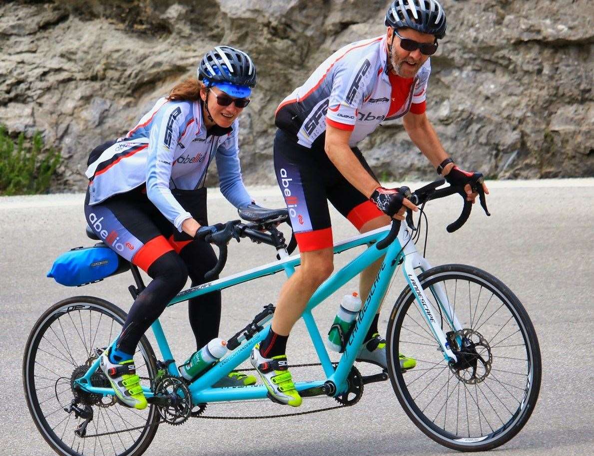 Kate and John Bosley on their tandem bike Picture: Miguel Pilgrim