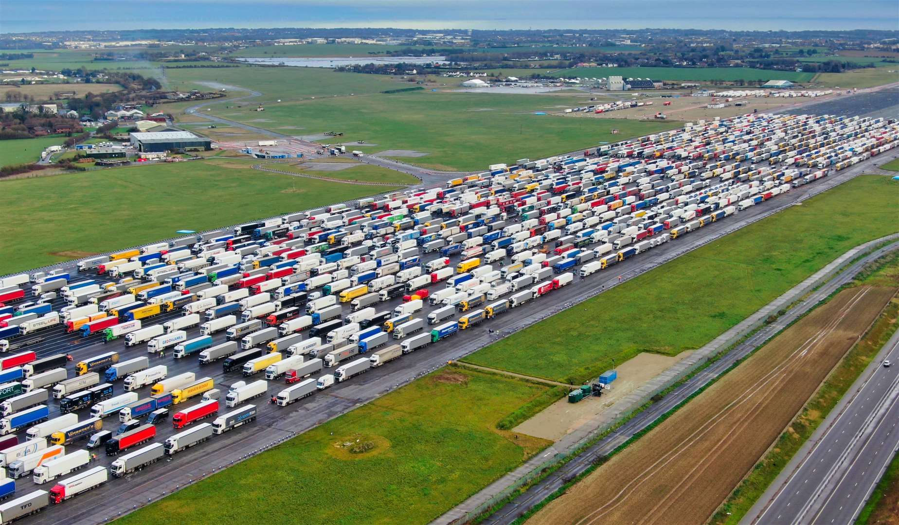 The huge number of lorries parked up at the former Manston Airport site Pic: Swifte Aerial Photography