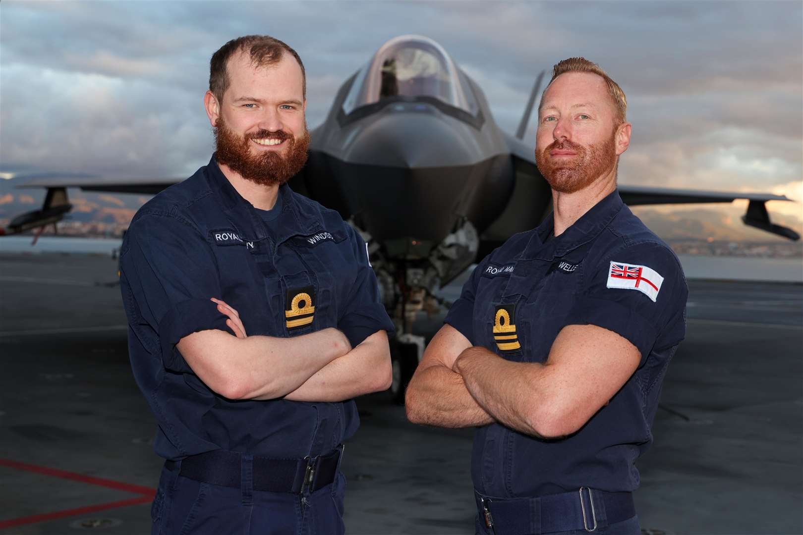 Lt Chris Windsor and Lt Cdr Jamie Weller on board HMS Queen Elizabeth have returned home to Kent for Christmas after 224 days at sea. Picture: MoD