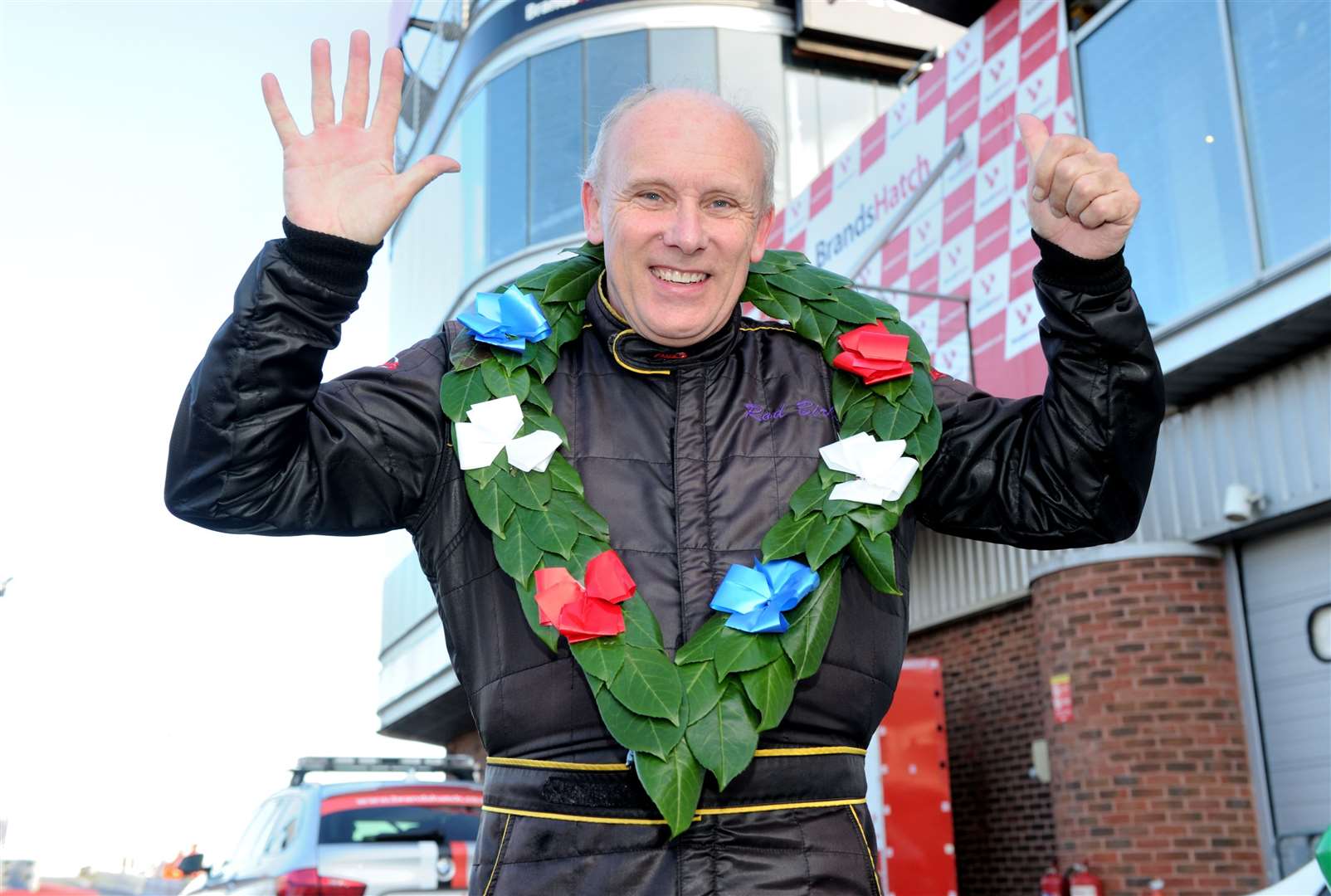 Birley lives a stone’s throw from Brands Hatch and returned home on Monday. He’s pictured in 2017 after beating Gerry Marshall's record for the most wins in British motor racing. Picture: Simon Hildrew