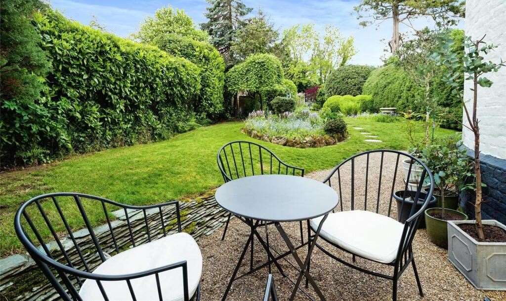 The spacious garden has plenty of room for al fresco entertaining. Picture: Freeman Forman