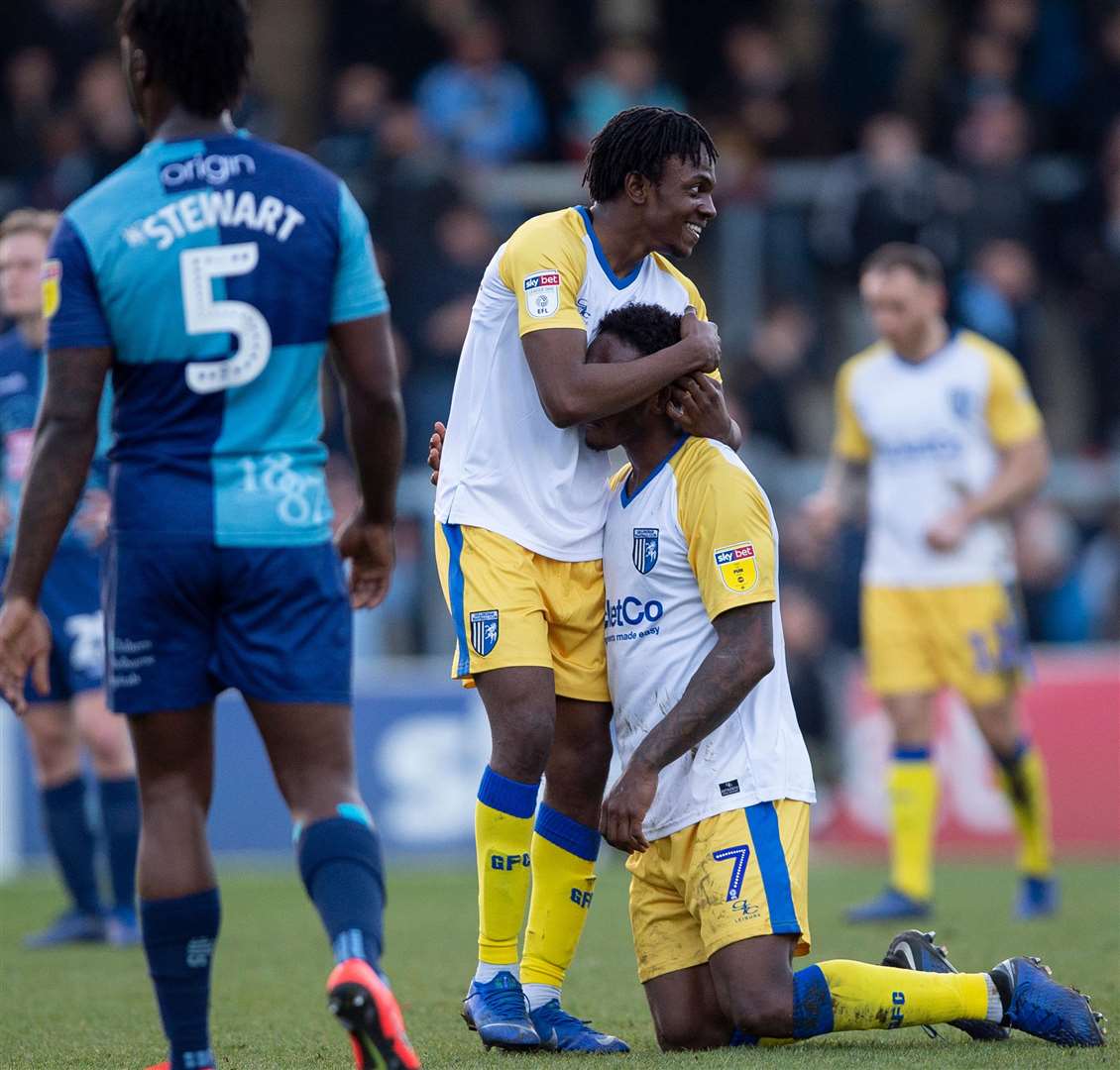 Regan Charles-Cook and Brandon Hanlan celebrate at the final whistle on Saturday after combining for the only goal of the game Picture: Ady Kerry