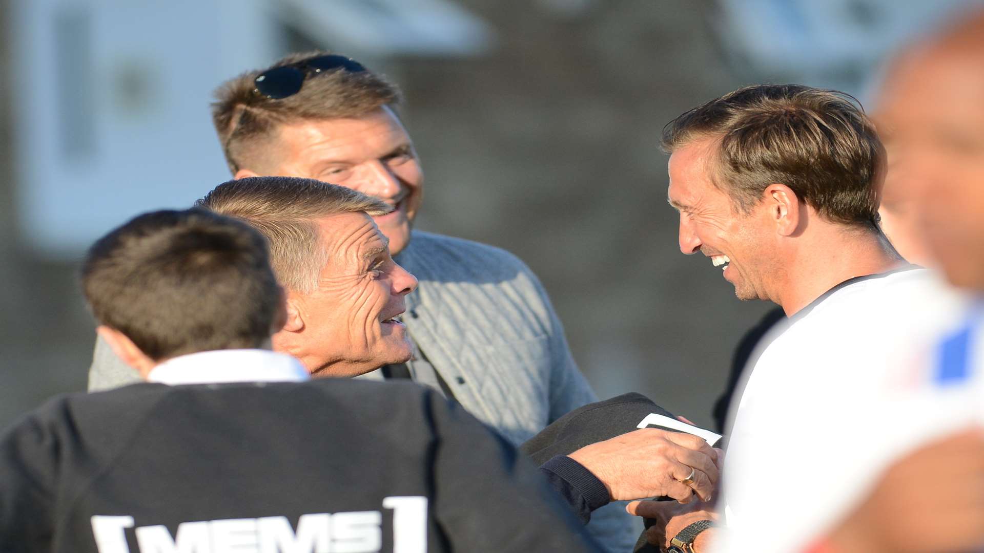 Former assistant Andy Hessenthaler shares a joke with Justin Edinburgh at the game Picture: Gary Browne