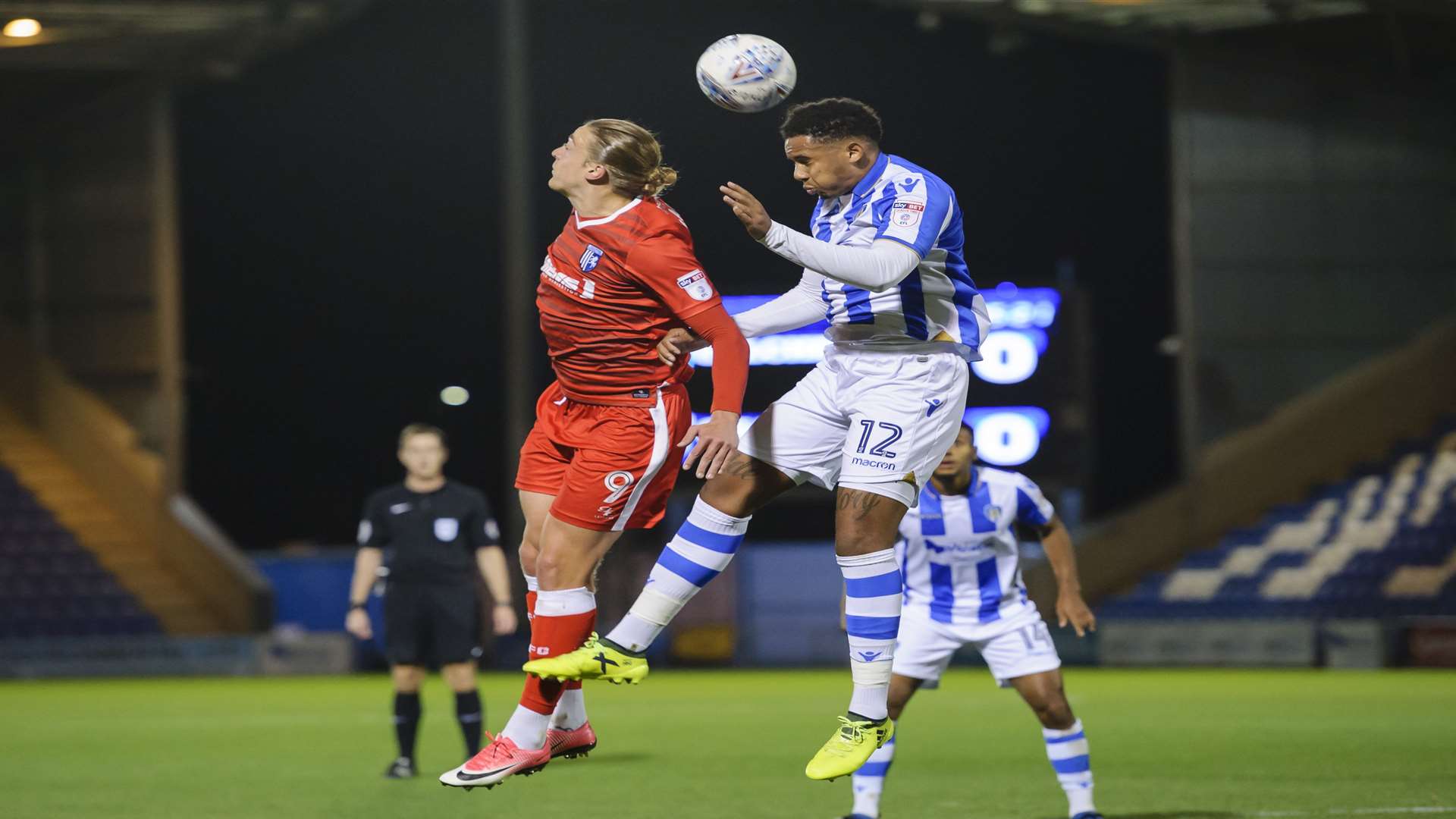 Tom Eaves goes up for the ball Picture: Andy Payton