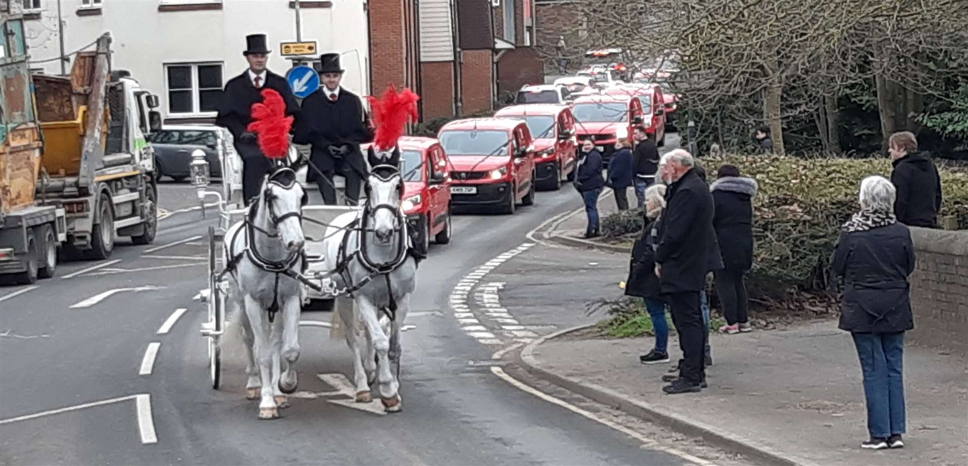 Some 40 post vans joined the cortège