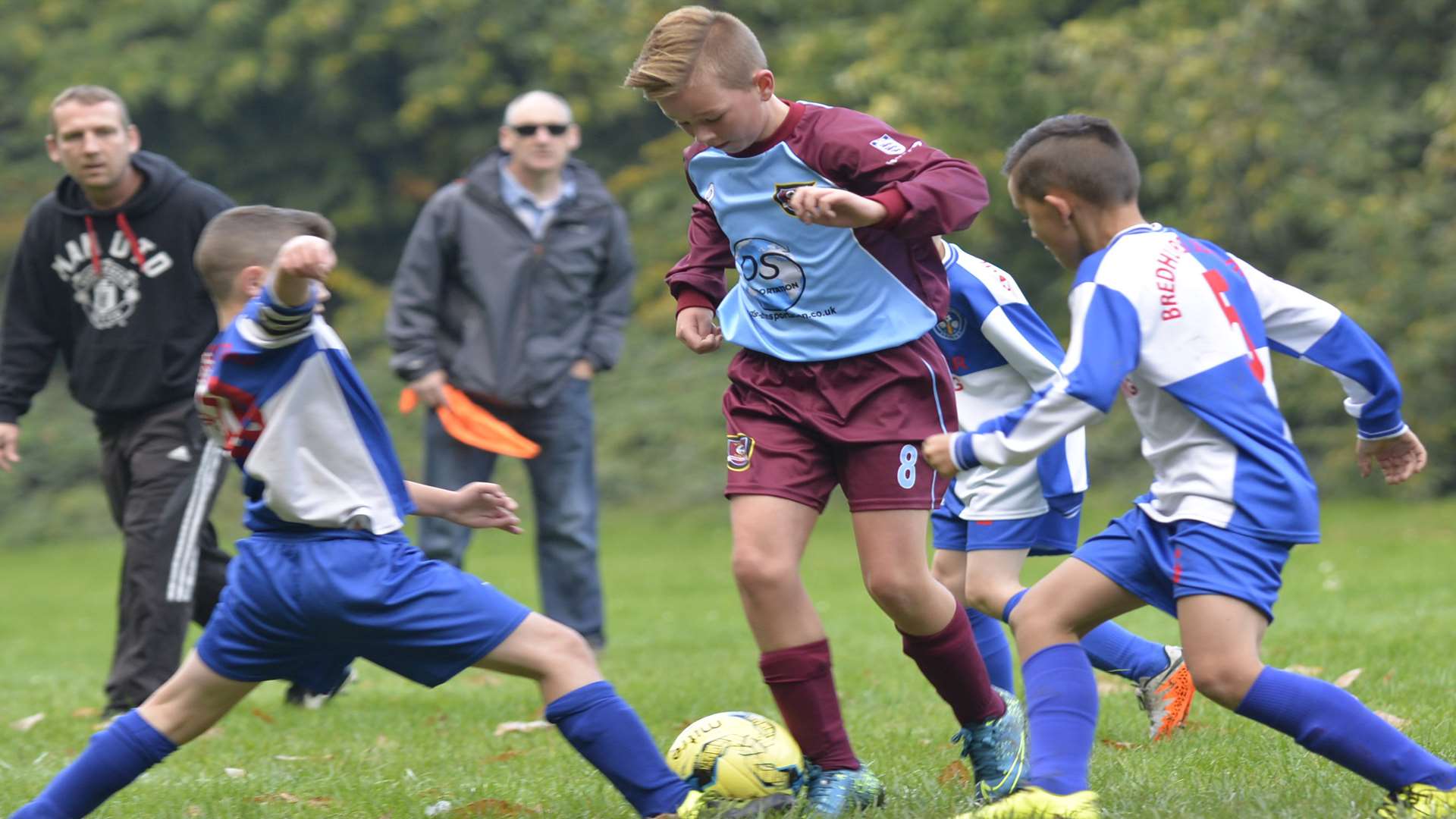 Wigmore Youth under-10s (purple) surrounded by Bredhurst Juniors Picture: Ruth Cuerden