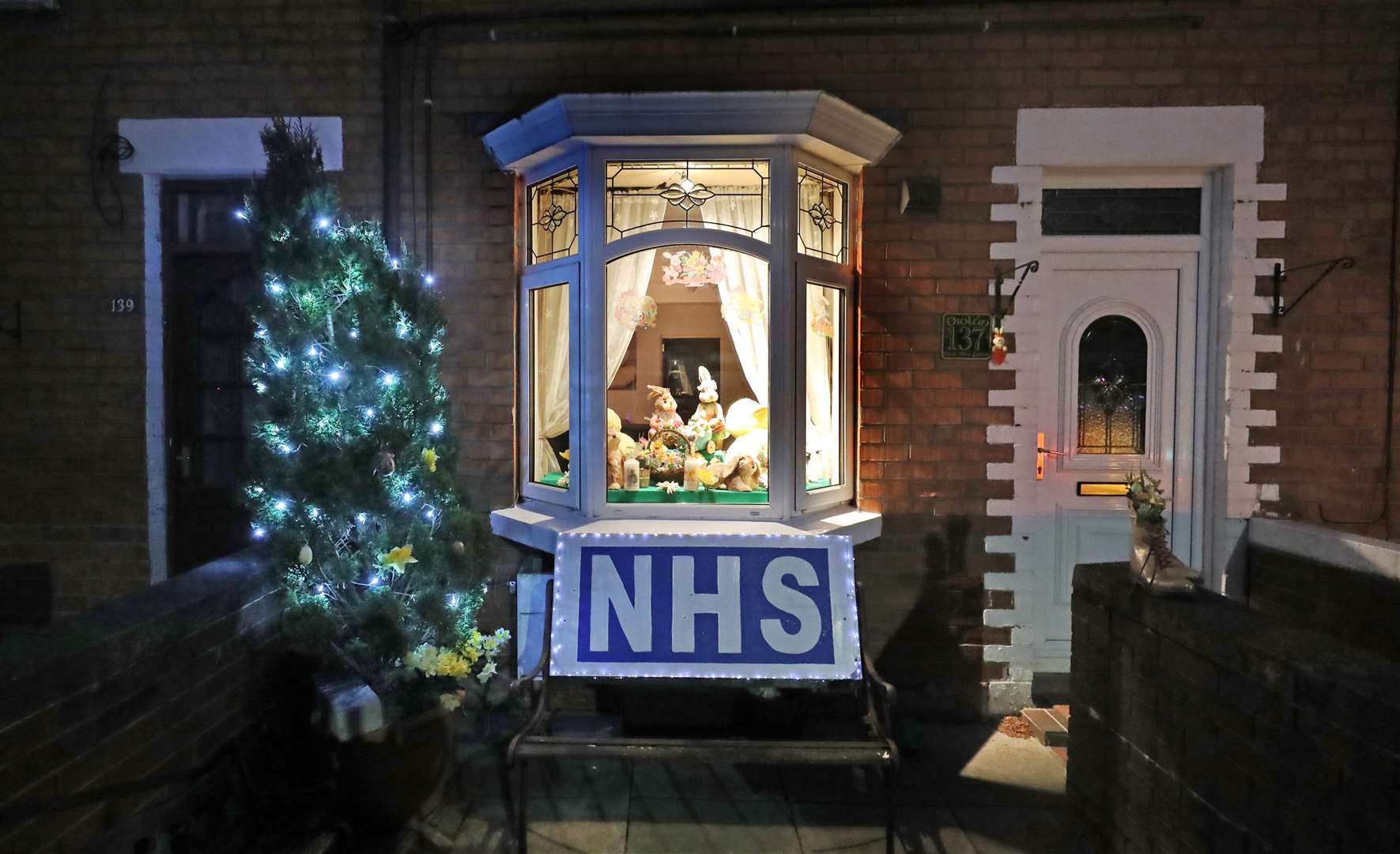 Residents of the St James Road area of Belfast, meanwhile, have put their Christmas decorations up to show their support for the NHS (Niall Carson/PA)