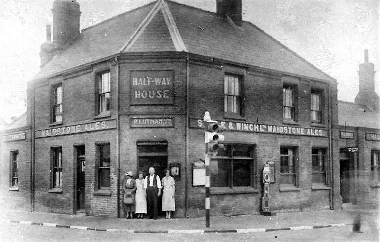 The Lutmans outside the pub