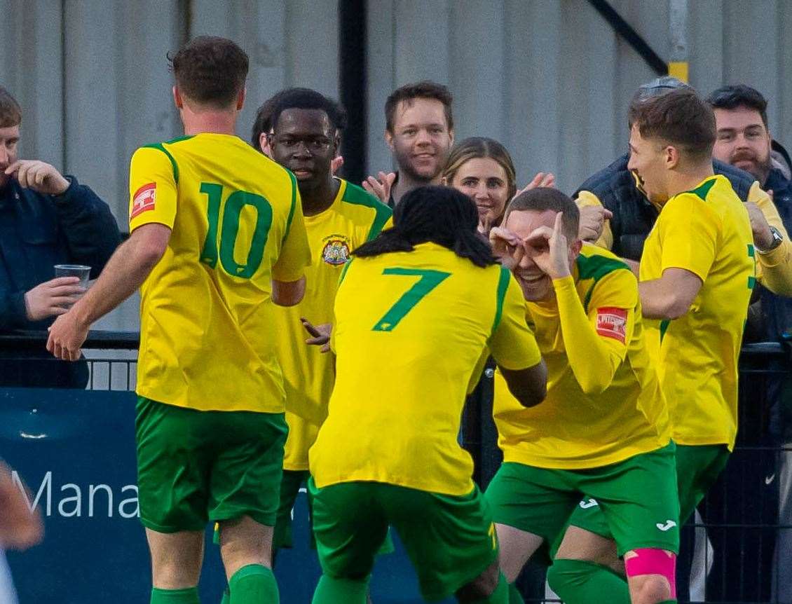 Former Faversham player Michael Hagan celebrates scoring for Corinthian with team-mate Ahmed Salim Futa. Picture: Ian Scammell