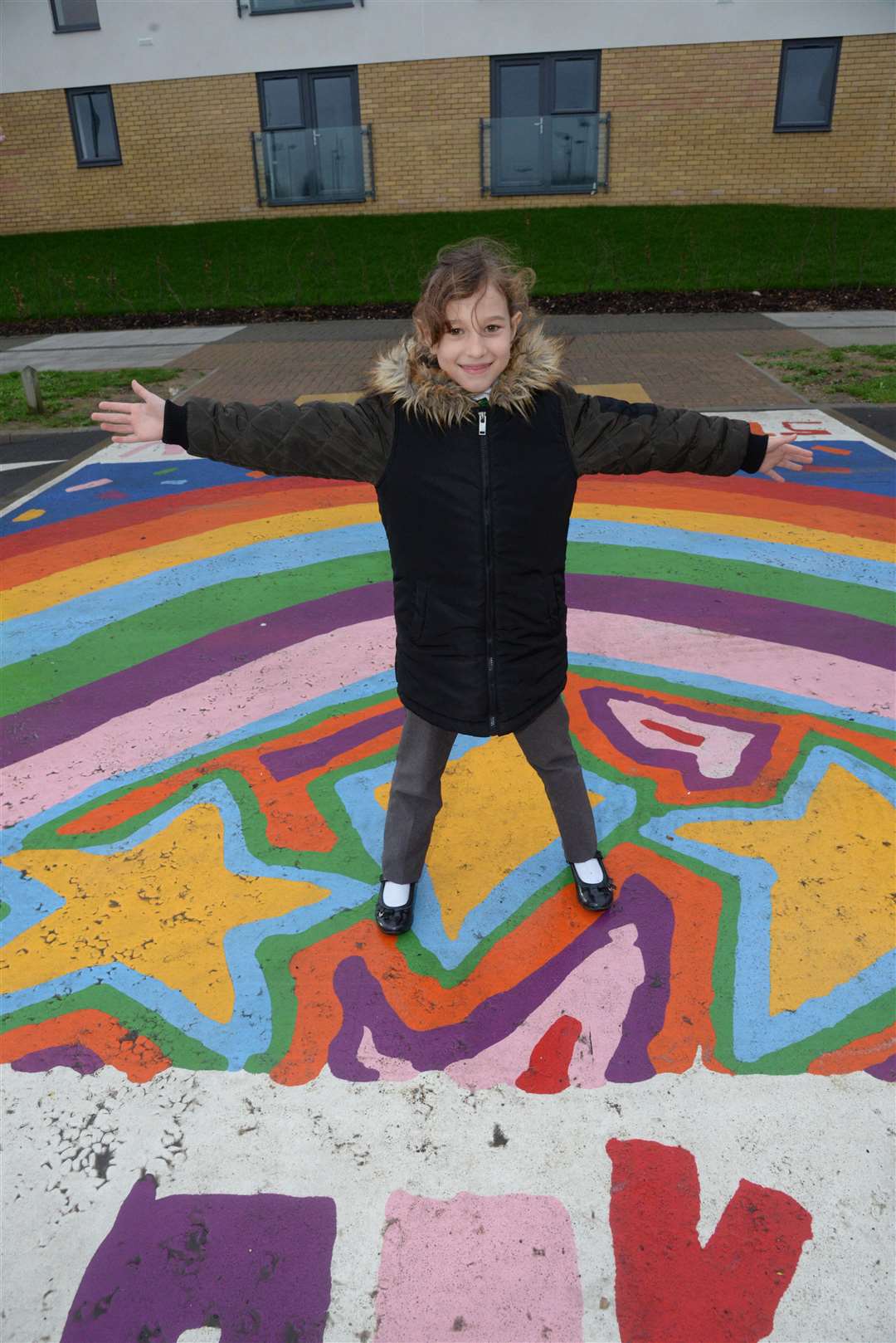 Competition winner Aina Serra Tubau, nine, and the new crossing she designed near St Mary's Island Primary School on Wednesday. Picture: Chris Davey