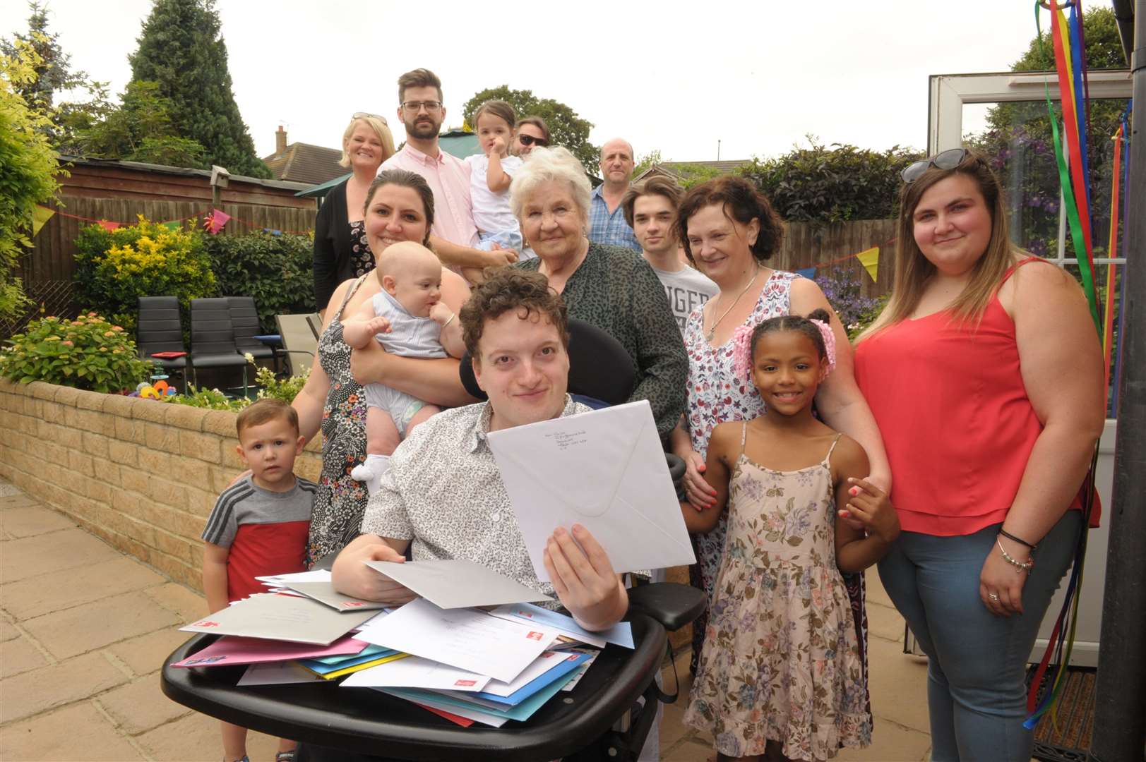 Samuel Boakes with friends and family Picture: Steve Crispe