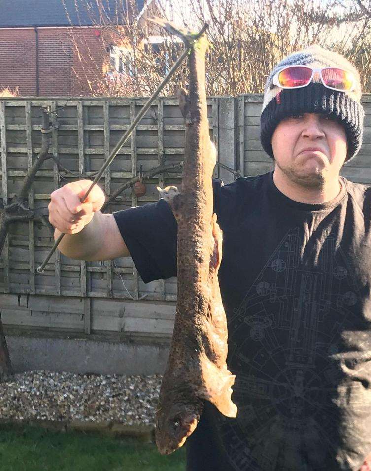 James with the two-foot catshark. Picture: SWNS.