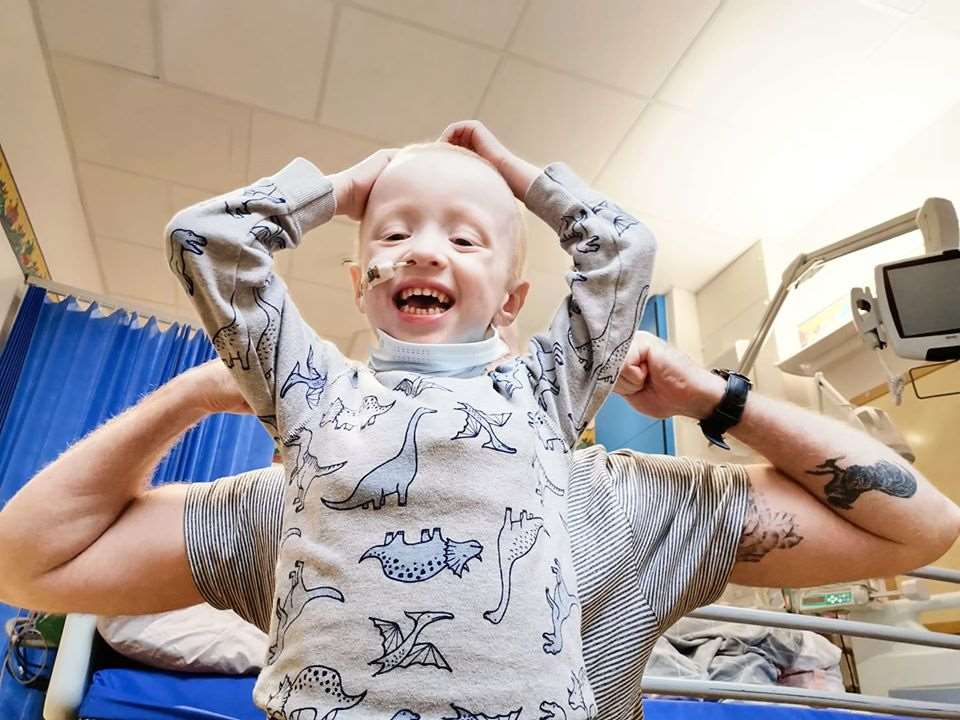 Archie and father Simon Wilks celebrate being told they can go home from Addenbrooke’s Hospital on April 1 (Family handout/PA)